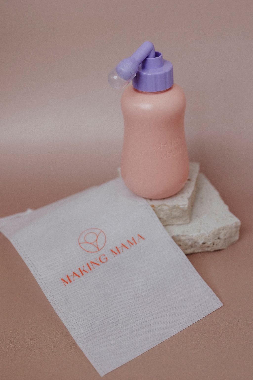 peri bottle with retracted nozzle, shown with carry bag